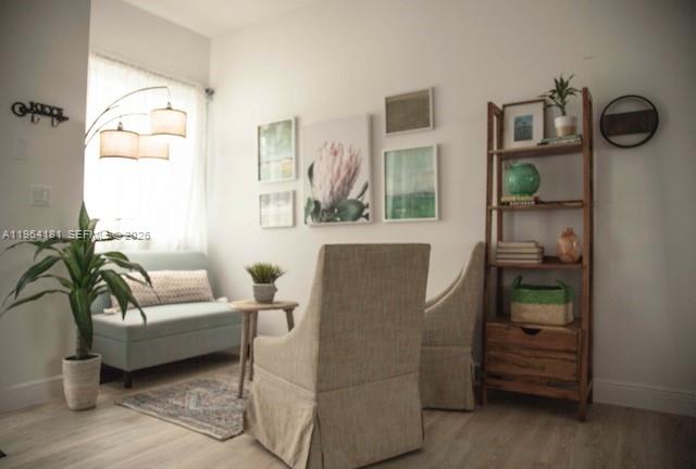 15105 Southwest 180th Street Miami, FL 33187 - Photo 4 of 21 a living room with furniture and a window