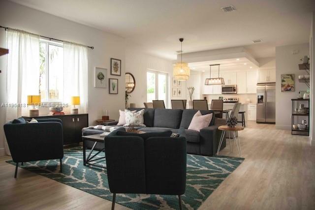 15105 Southwest 180th Street Miami, FL 33187 - Photo 5 of 21 a living room with fireplace furniture and a large window