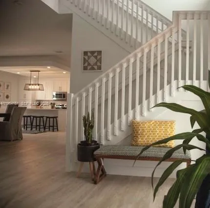 a view of a entryway with wooden floor