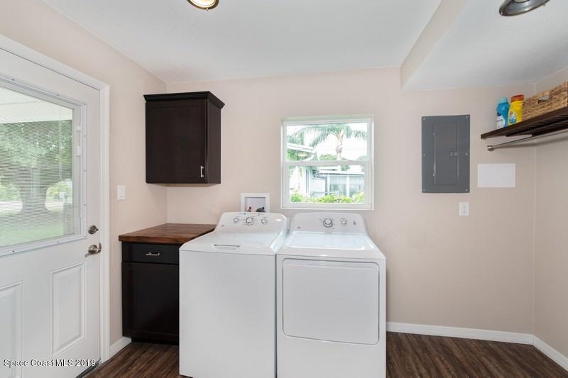 2614 Locksley Road Melbourne, FL 32935 - Photo 9 of 10 Laundry room under air