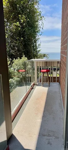 a view of a terrace with chairs