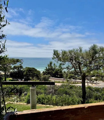 a view of a lake from a balcony