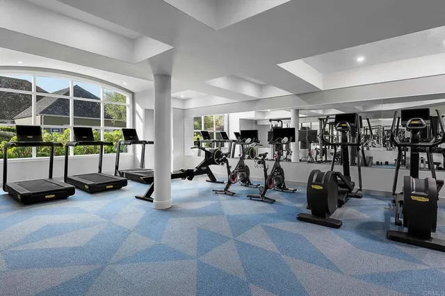 a view of a room with gym equipment
