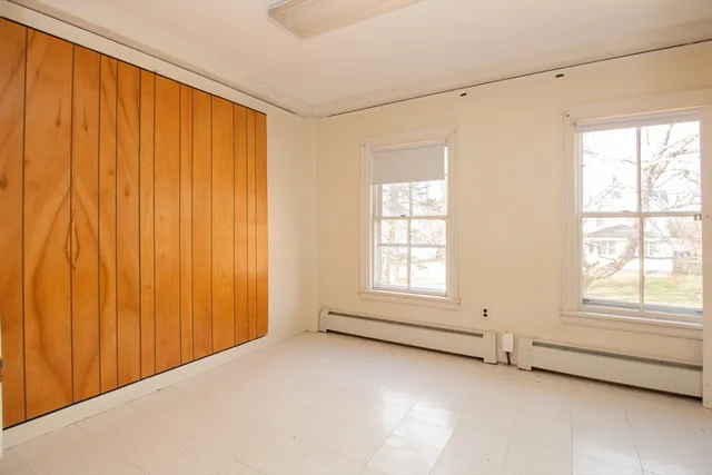 an empty room with windows