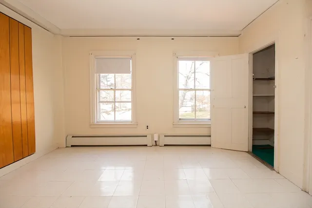wooden floor and window in a room