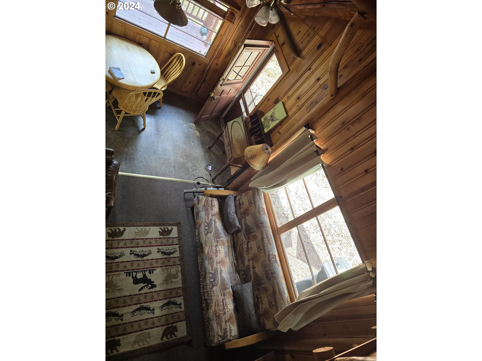 59975 Pollock Road Joseph, OR 97846 - Photo 13 of 34 a view of walk in closet with clothes and shoes