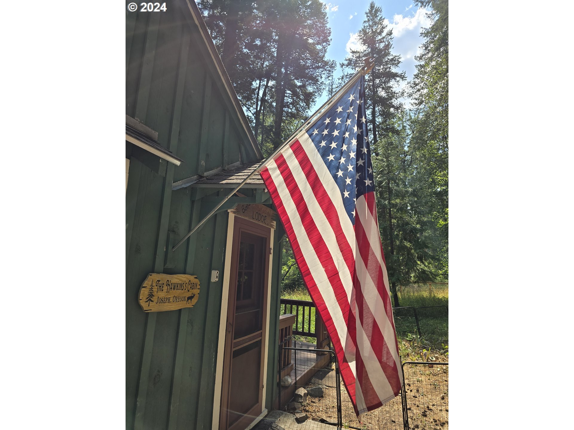 59975 Pollock Road Joseph, OR 97846 - Photo 30 of 34 a close up of a red and white bird
