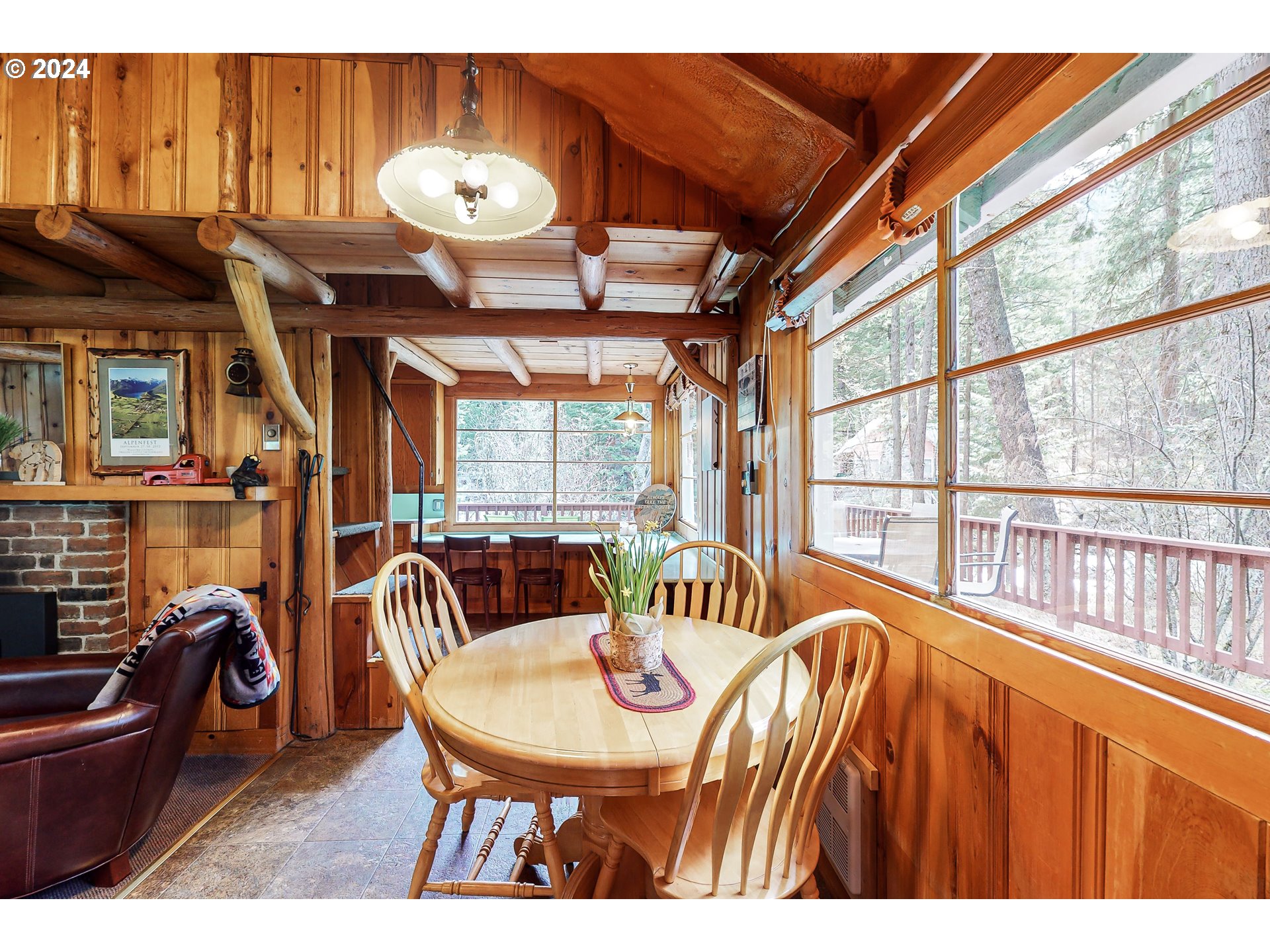 59975 Pollock Road Joseph, OR 97846 - Photo 6 of 34 a view of a dining room with furniture window and outside view