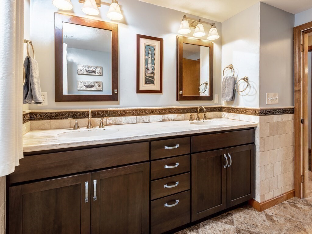14 Killdeer Road Webster, MA 01570 - Photo 13 of 30 a bathroom with a sink vanity and a mirror