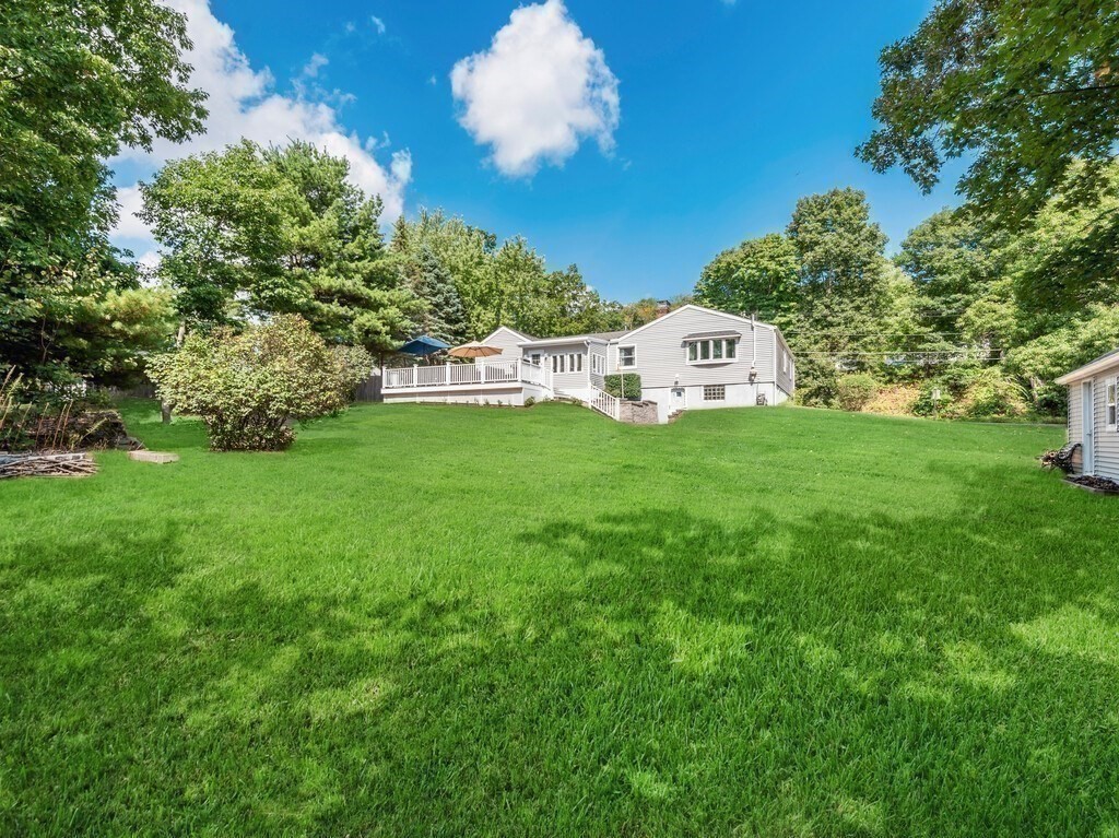 14 Killdeer Road Webster, MA 01570 - Photo 28 of 30 a white house with a big yard and large trees