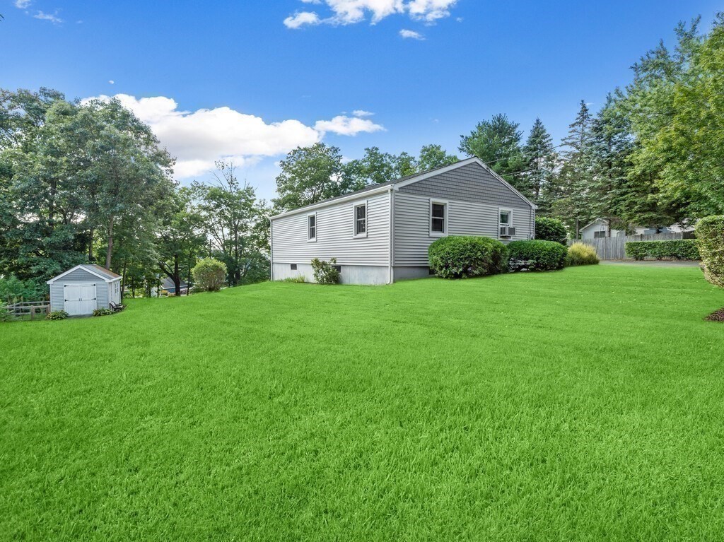 14 Killdeer Road Webster, MA 01570 - Photo 30 of 30 a front view of a house with garden