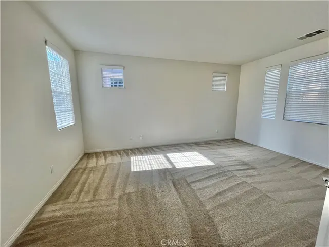 a spacious bathroom with a bathtub shower and a sink