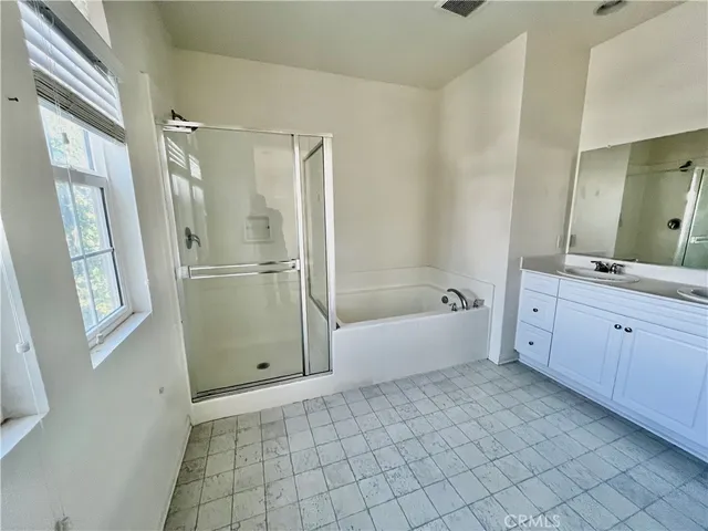 a view of empty room with windows