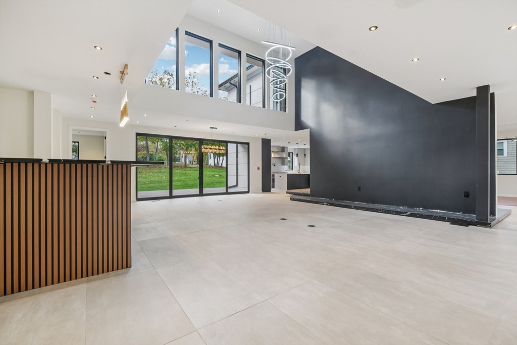 a view of an empty room with a balcony