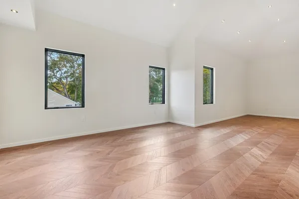 an empty room with windows