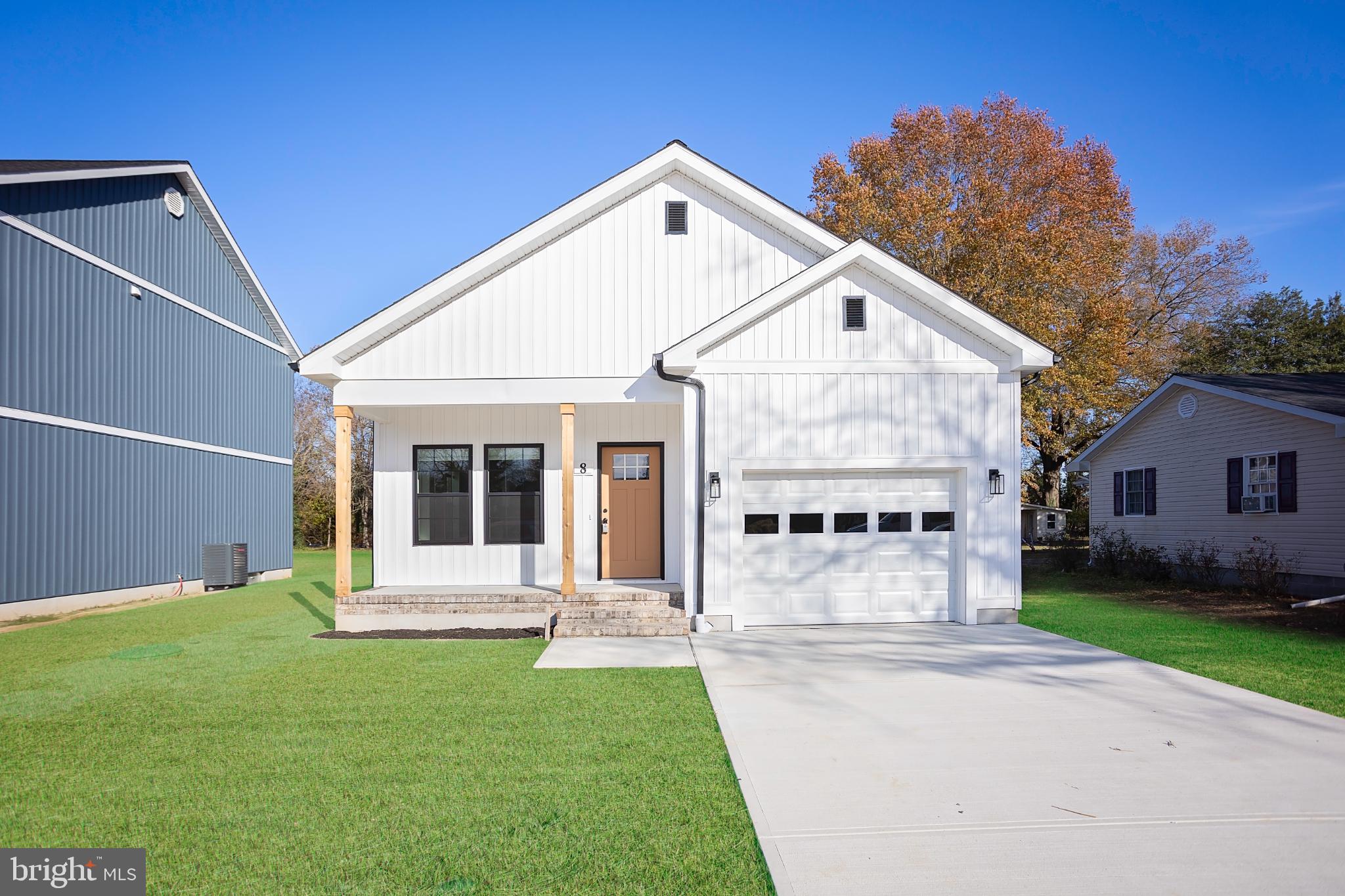 8 Sunrise Avenue Ridgely, MD 21660 - Photo 1 of 23 Charming modern home. Grass digitally enhanced.