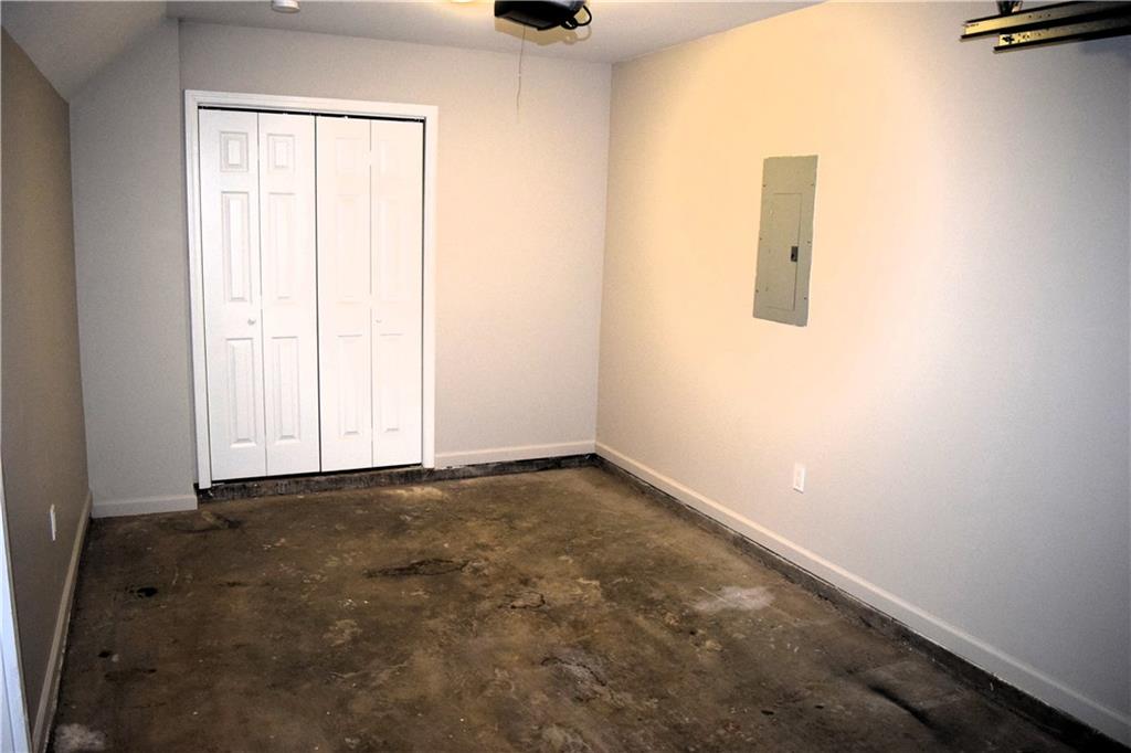 253 Woodland Way Canton, GA 30114 - Photo 16 of 28 a view of an empty room