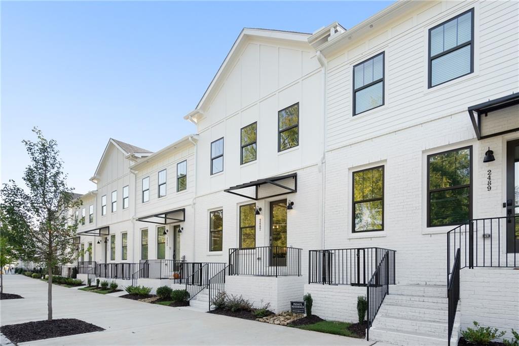 2487 Sycamore Road Northwest, Unit 7 Atlanta, GA 30318 - Photo 1 of 1 a view of a building with a street