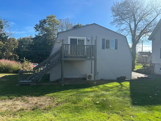 a front view of house with garden