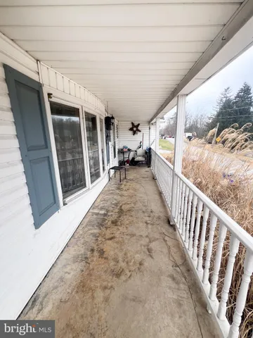 a view of porch with seating space