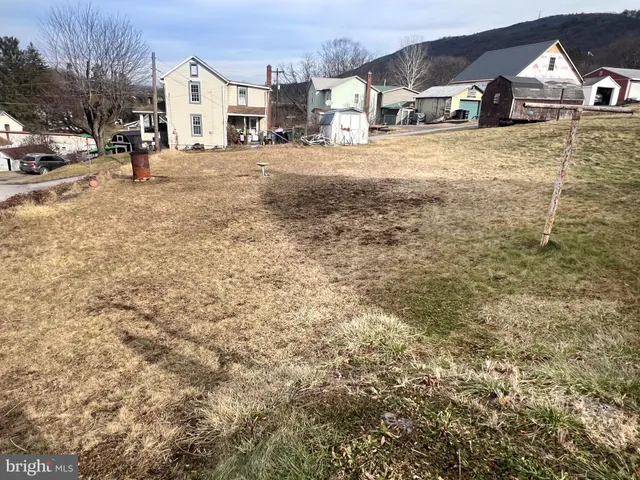 a view of a city street and a building