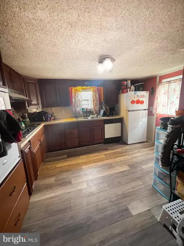 a view of kitchen and living room