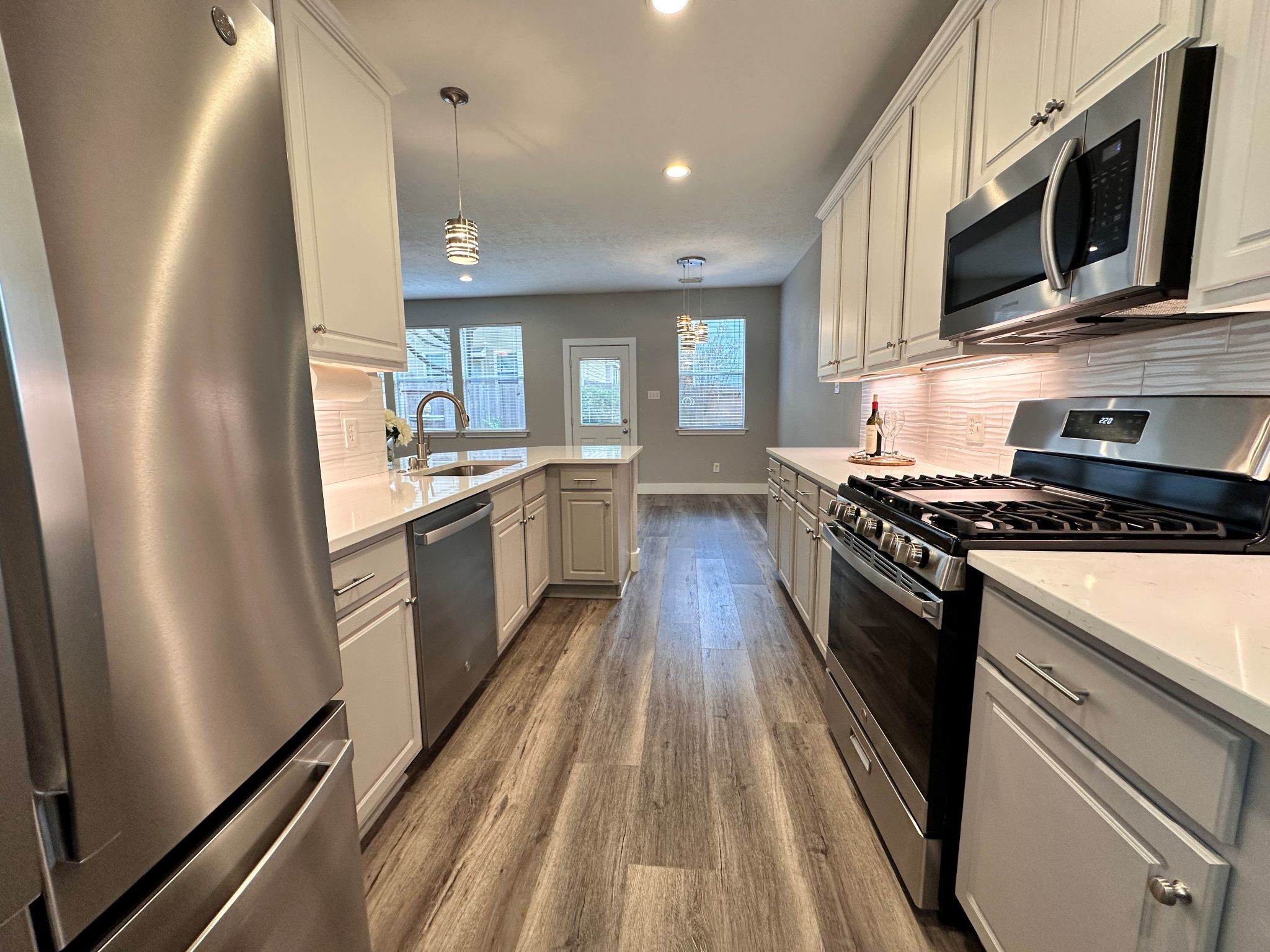 46 Summer Haze Circle The Woodlands, TX 77382 - Photo 11 of 43 Like new stainless appliances. French style refrigerator included.