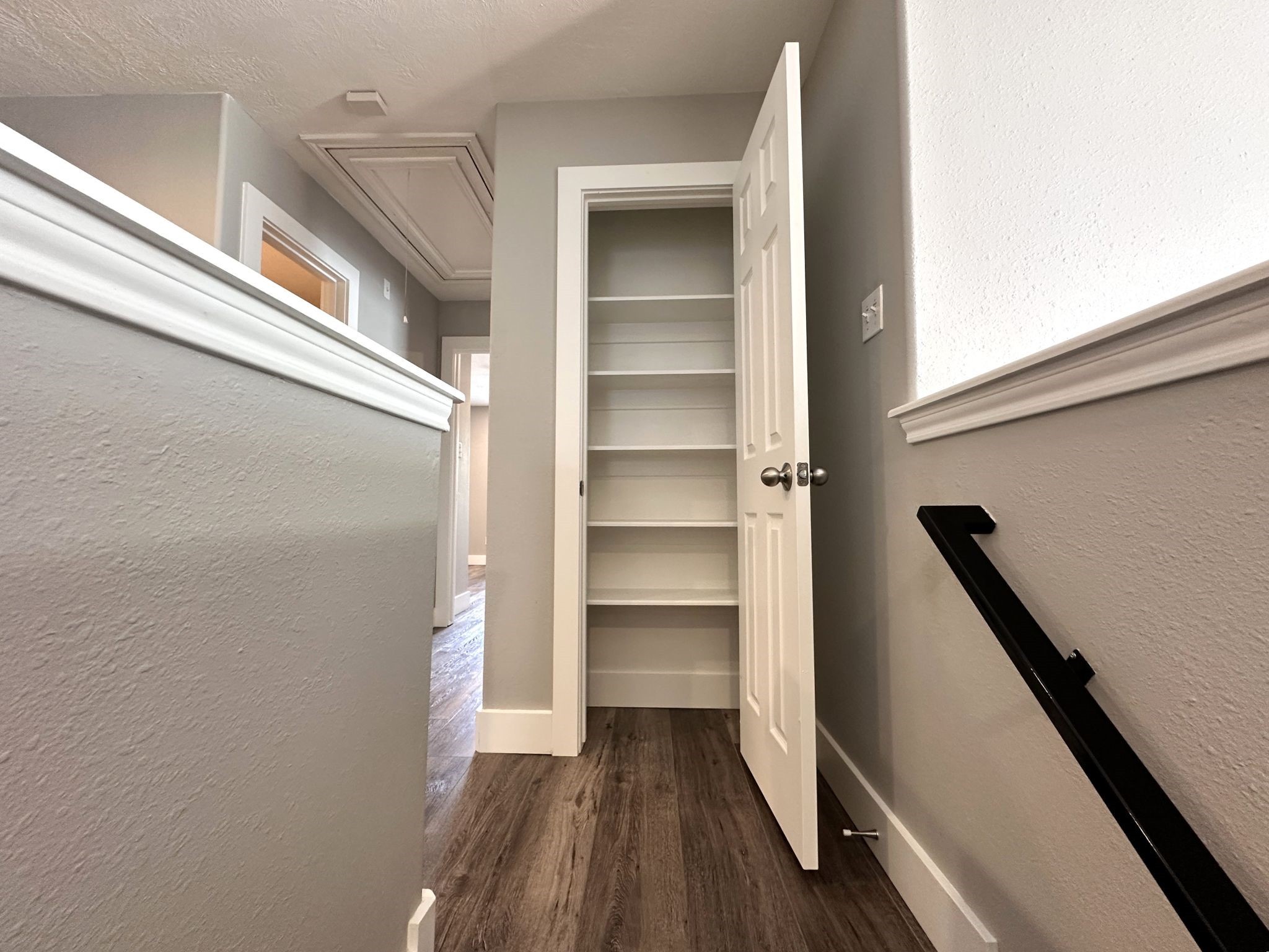 46 Summer Haze Circle The Woodlands, TX 77382 - Photo 17 of 43 Extra closet at top of stairs for extra storage.