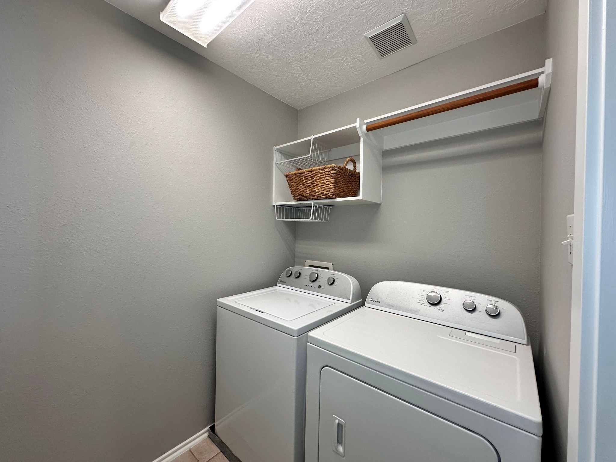 46 Summer Haze Circle The Woodlands, TX 77382 - Photo 27 of 43 Second floor laundry with plenty of space to work.