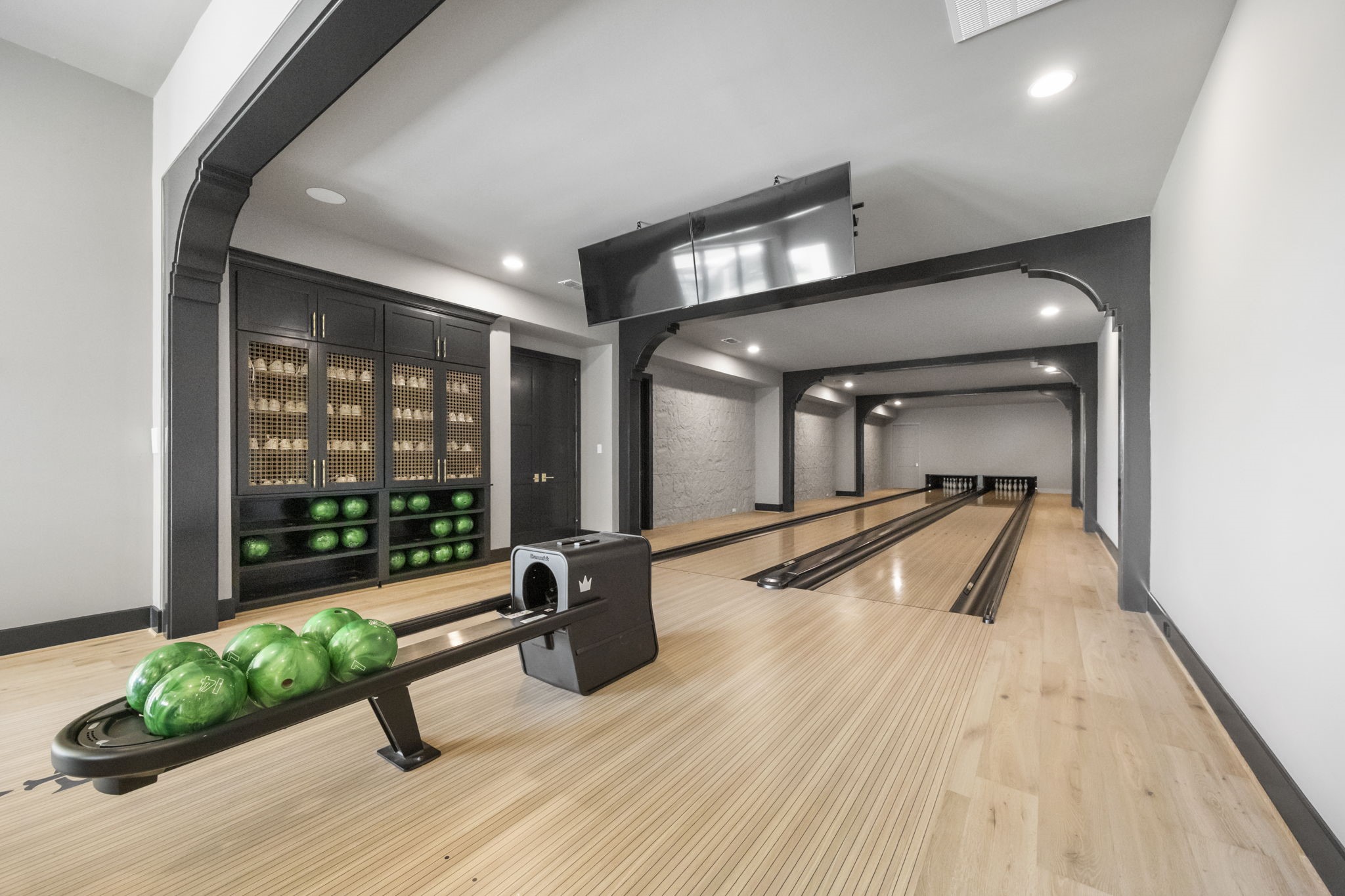 4233 Two Gun Way Katy, TX 77494 - Photo 34 of 47 Brunswick 2 lane bowling alley with shoe and ball storage to the left.