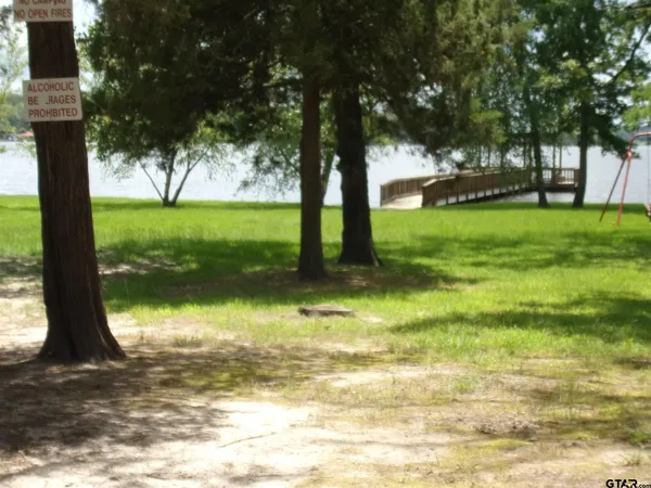 a view of swimming pool from a yard