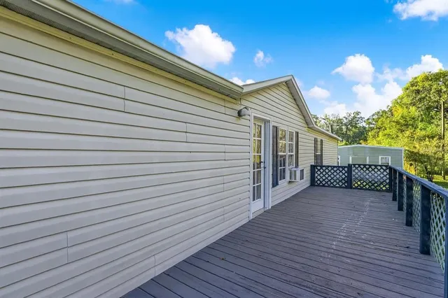 a view of a house with a deck