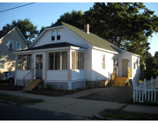 359 Nottingham Street Springfield, MA 01104 - Photo 1 of 1 a front view of a house with garden