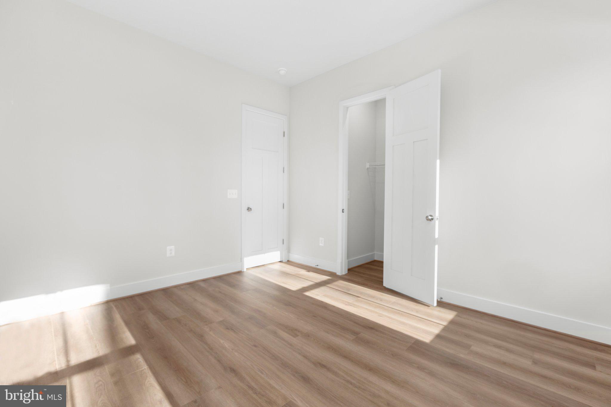 10 Burwell Road Nokesville, VA 20181 - Photo 20 of 57 a view of an empty room with wooden floor