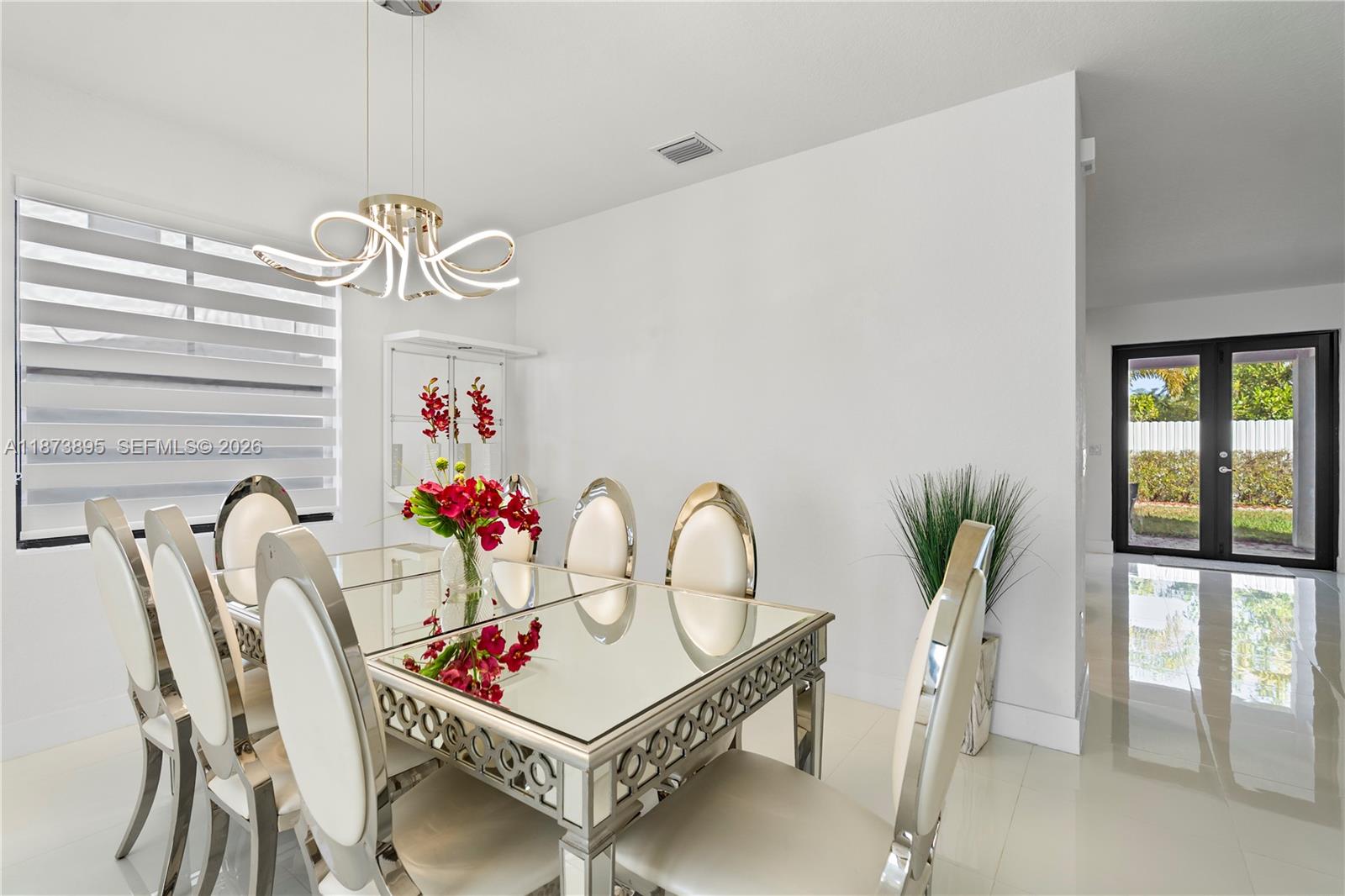 14841 Southwest 39th Terrace Miami, FL 33185 - Photo 11 of 57 a living room with furniture