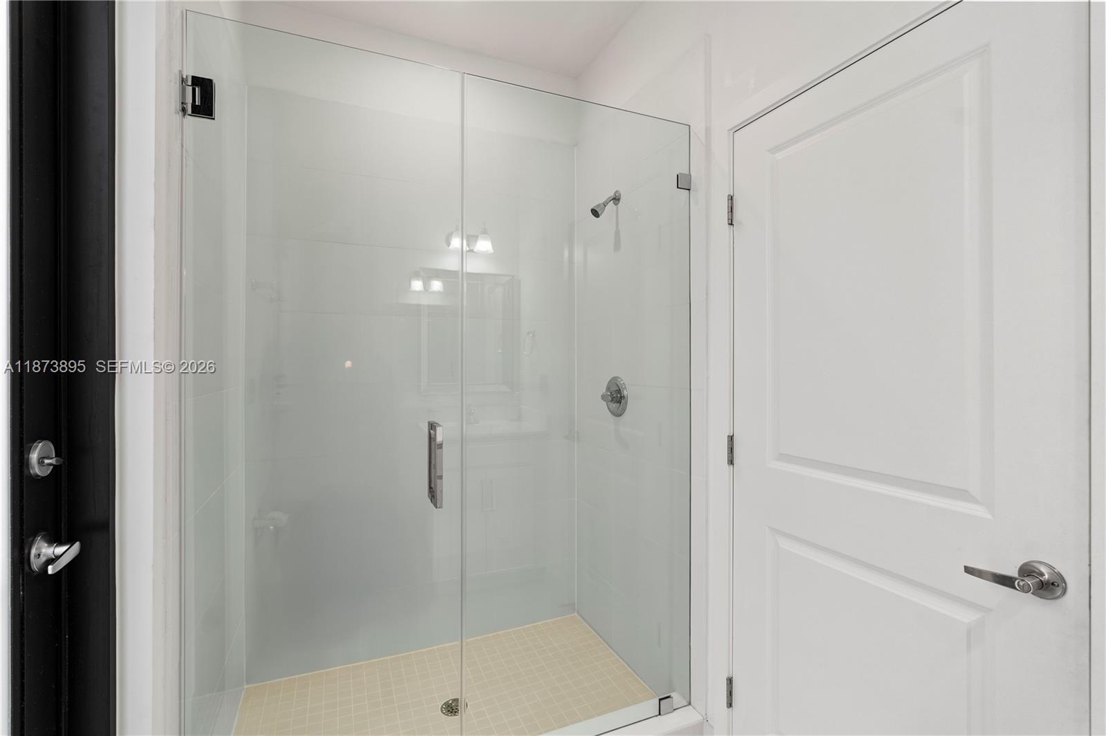 14841 Southwest 39th Terrace Miami, FL 33185 - Photo 23 of 57 a bathroom with a shower