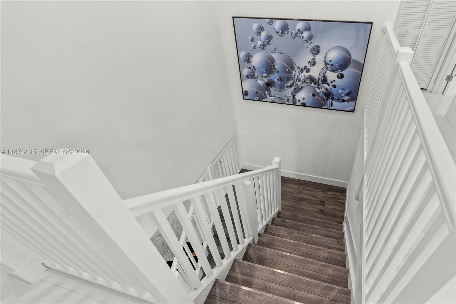 14841 Southwest 39th Terrace Miami, FL 33185 - Photo 26 of 57 a view of a hallway with stairs