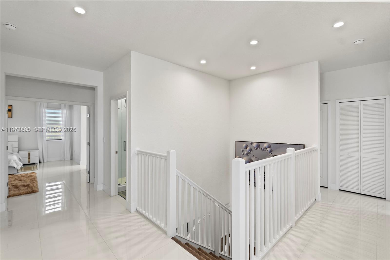 14841 Southwest 39th Terrace Miami, FL 33185 - Photo 28 of 57 a view of a hallway with a livingroom