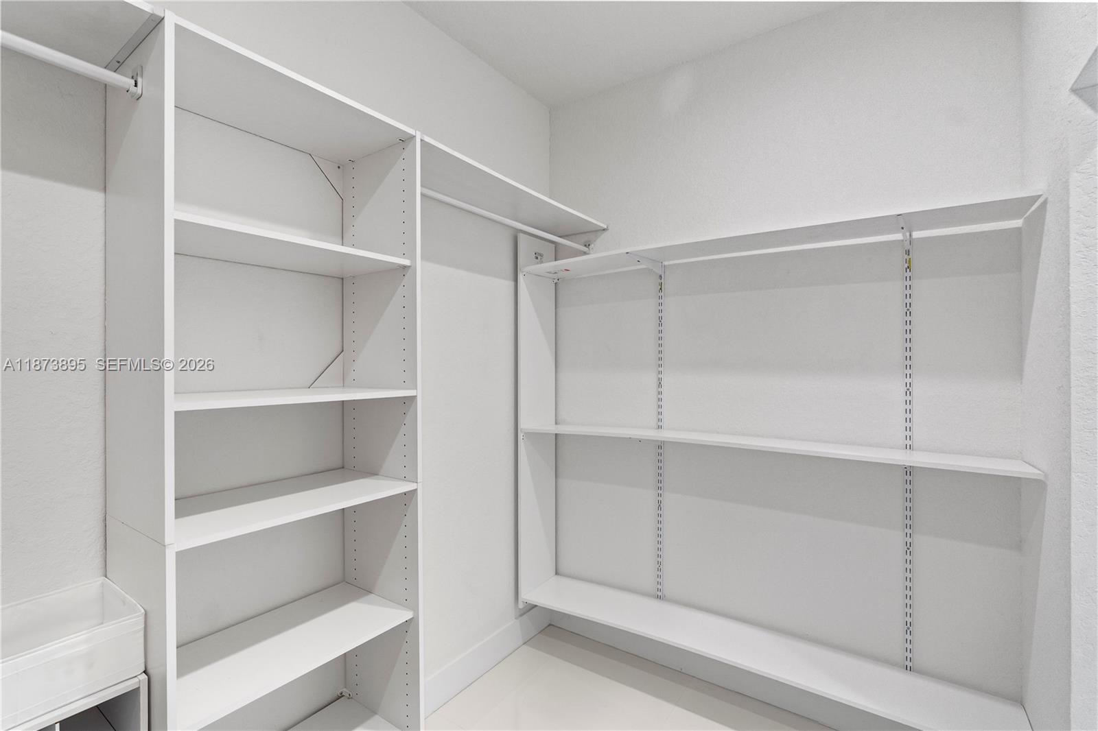 14841 Southwest 39th Terrace Miami, FL 33185 - Photo 37 of 57 a view of an empty walk in closet