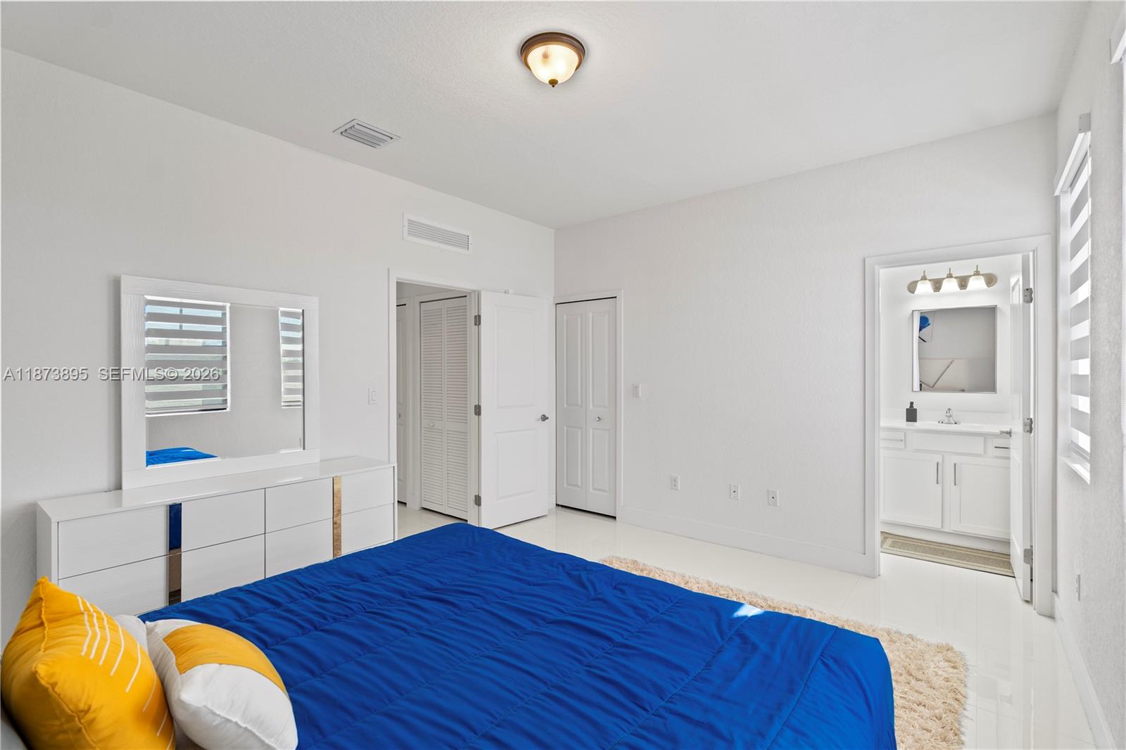 14841 Southwest 39th Terrace Miami, FL 33185 - Photo 45 of 57 wooden floor in an empty room with a window