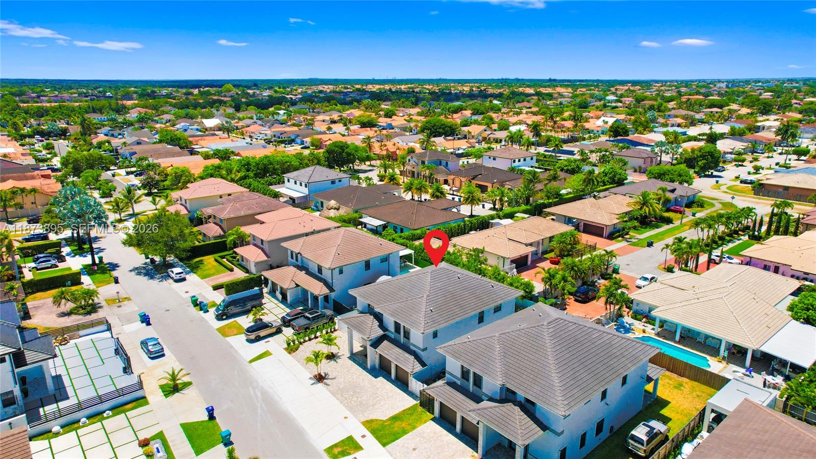 14841 Southwest 39th Terrace Miami, FL 33185 - Photo 57 of 57 an aerial view of residential houses with outdoor space and trees