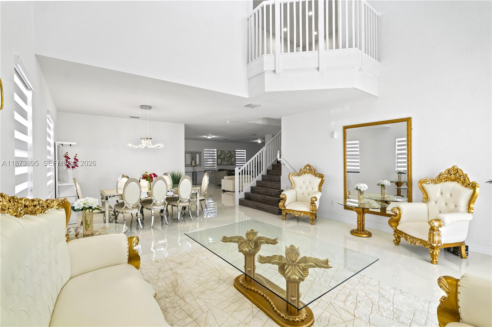 14841 Southwest 39th Terrace Miami, FL 33185 - Photo 9 of 57 a living room with furniture