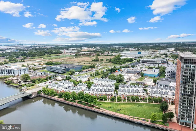 aerial view of a city with lake view