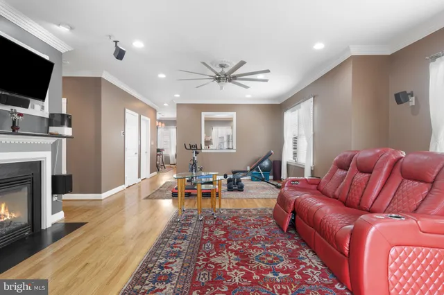 a room with furniture and wooden floor