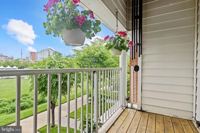 a spacious bedroom with a large bed and a fireplace