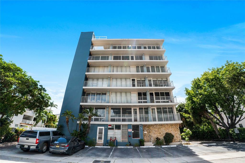 524 Orton Avenue, Unit 604 Fort Lauderdale, FL 33304 - Photo 19 of 24 a view of a car parked in front of a building