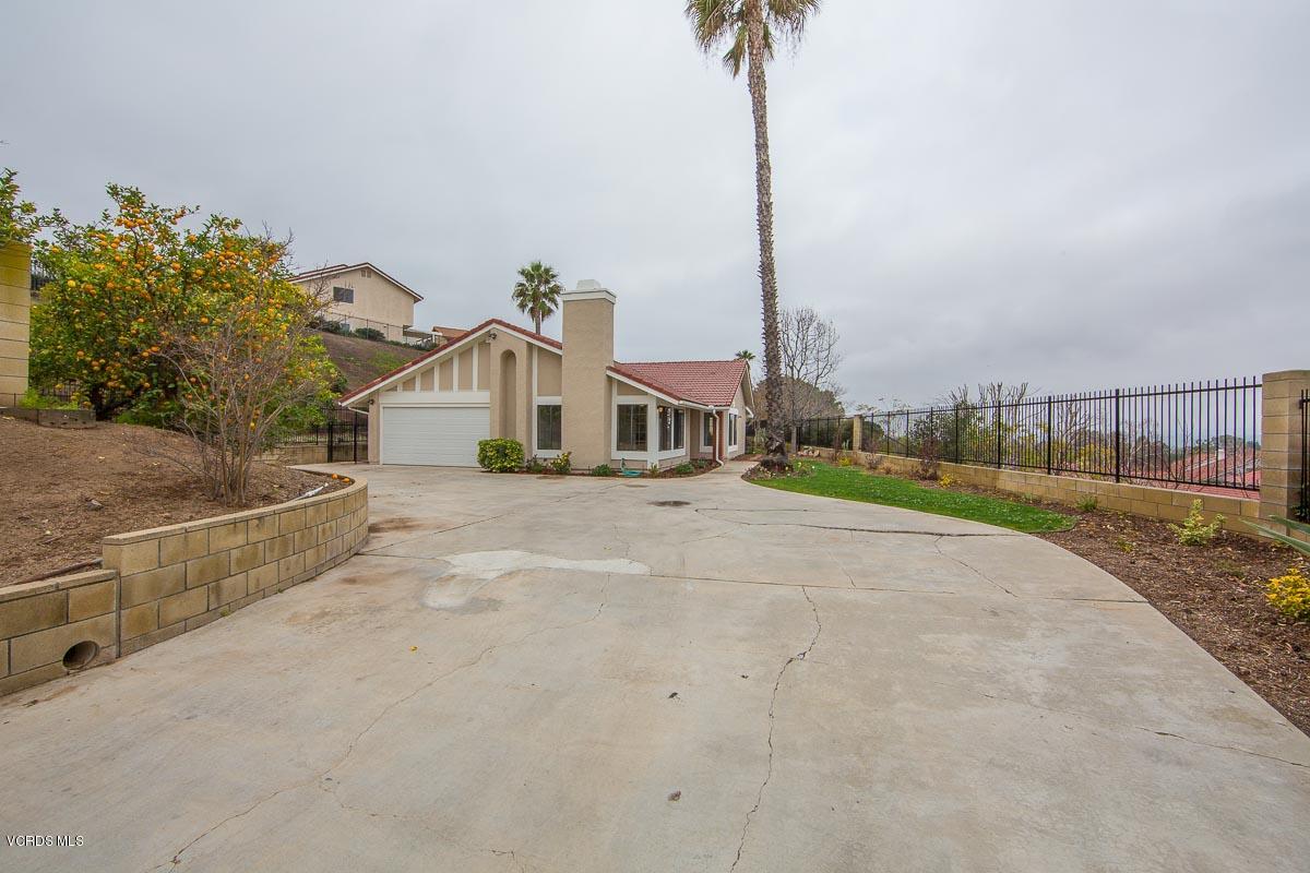 4265 Laurelhurst Road Moorpark, CA 93021 - Photo 2 of 47 a view of a city street with a road