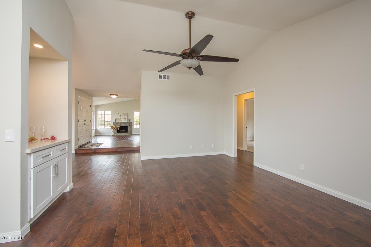 4265 Laurelhurst Road Moorpark, CA 93021 - Photo 11 of 47 a view of a kitchen with a sink and wooden floor