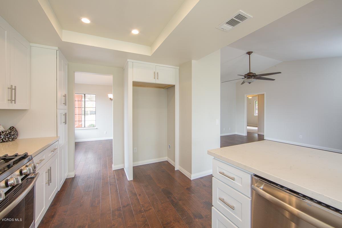 4265 Laurelhurst Road Moorpark, CA 93021 - Photo 14 of 47 a kitchen with a sink and a refrigerator