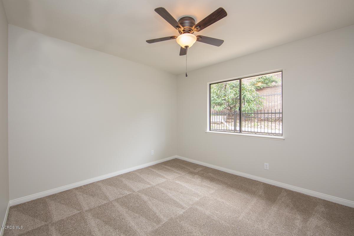 4265 Laurelhurst Road Moorpark, CA 93021 - Photo 16 of 47 an empty room with a window and a fan
